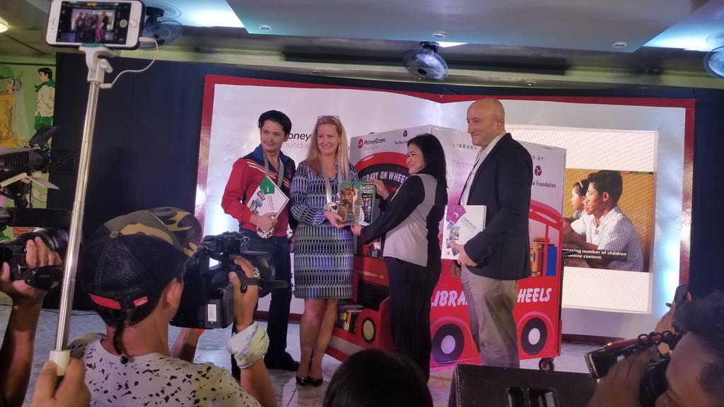 WenTx's tweet photo. @MoneyGram MoneyGram Foundation and Asia Foundation event unveiling the new 'Library on Wheels' at the Aurora A. Quezon Elementary School in Manila. Surprise appearance by #RobinPadilla! https://t.co/8G9zPAzIlR
