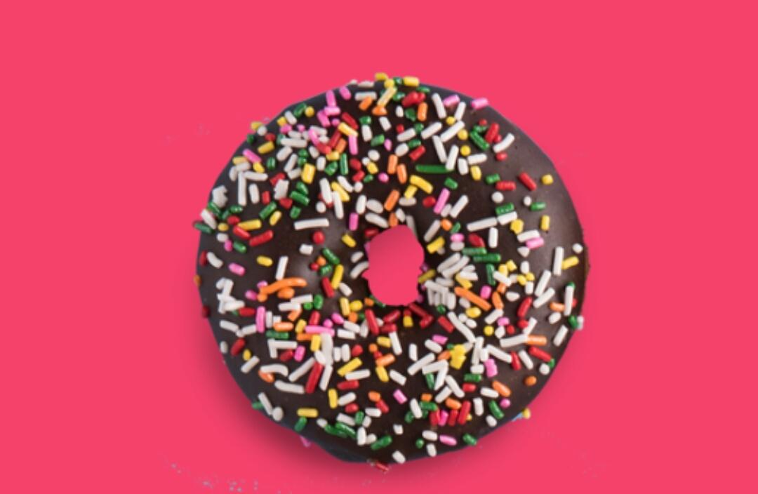Creamkingsng's tweet photo. Chocolate Icing with rainbow sprinkles. 

#CreamKings #DonutVault https://t.co/gub0XbeSER