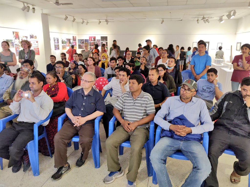 MTJNepal's tweet photo. Screening of गोरखामा १ विद्यार्थीको हत्या, a school boy died in police firing in Gorkha district, supposedly the first casualty of the People's War, gallery jam packed @NepalNHRC Chair Anup Raj Sharma and NEFAD Chair @RamBhandariNEP #Nepal #mtj2018 #TransitionalJustice https://t.co/iuF7X3a1rY