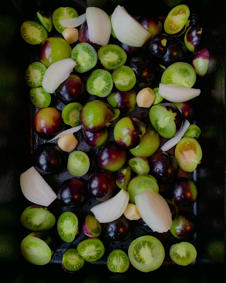 Cluckmuckcook's tweet image. Homegrown purple tomatoes, onions and garlic. Just about to be popped into the oven to slow roast, before I make a homemade balsamic tomato ketchup. It will be interesting if it keeps its purple colour. #eatcaptureshare #allotment #homegrown #ketchup #tomato #gbbo