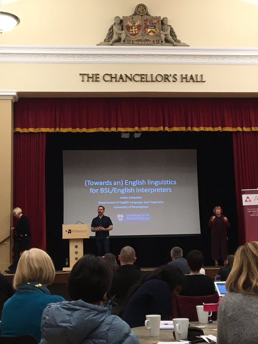 ASLIuk's tweet photo. We are very lucky to have @AdamCSchembri as our first workshop presenter this afternoon, exploring English #linguistics for #BSL / English interpreters. He argues that we often focus more on acquiring BSL than on understanding how our first language works. #ASLIAGM #sl1nt https://t.co/W6uysFXCCG