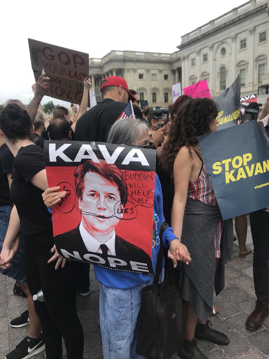 cursinyourname's tweet image. these beautiful humans made a circle around a man wearing a trump hat #KavaNOPE