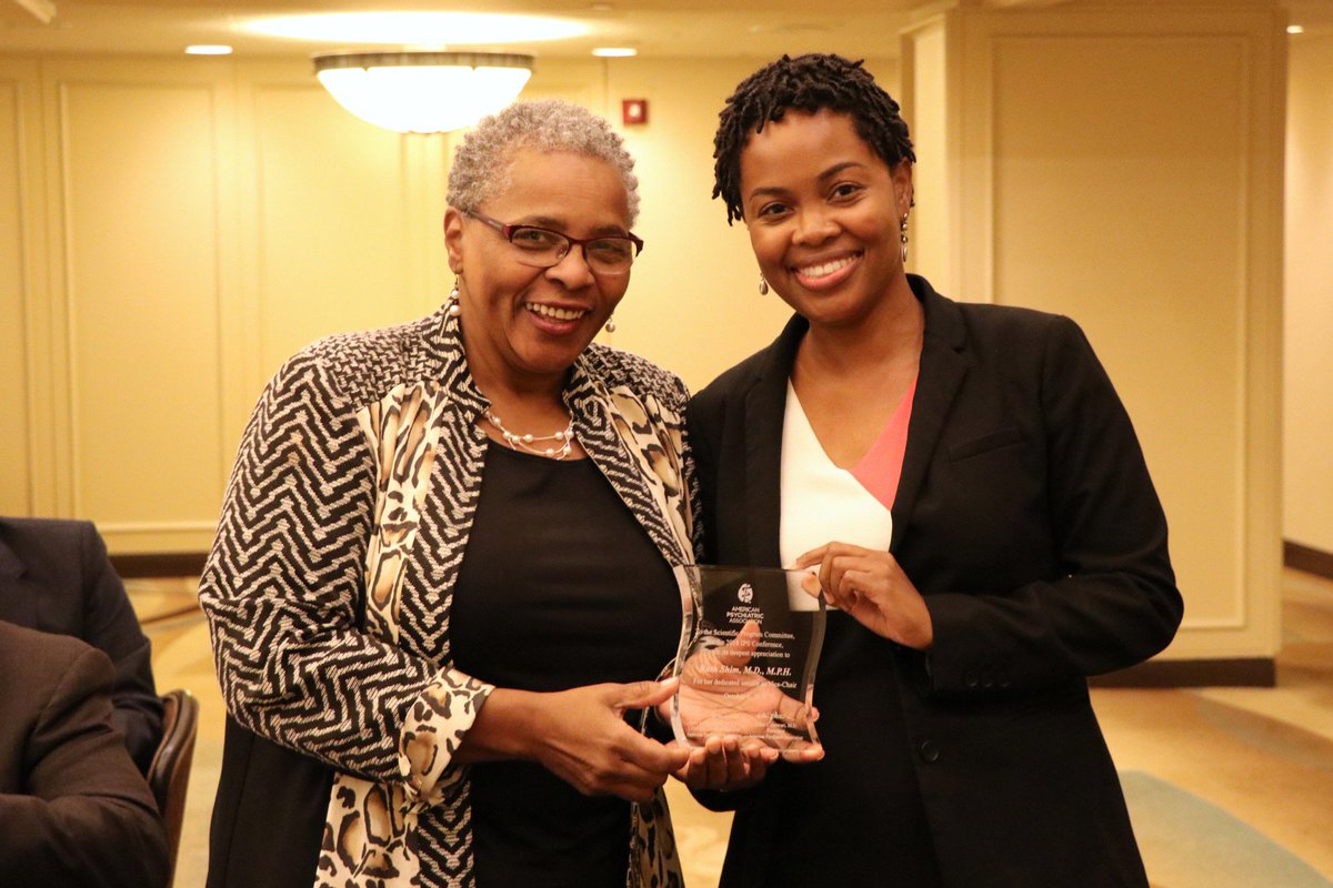 APApsychiatric's tweet photo. APA President @DrAlthaStewart presents recognition plaques at the Scientific Program Committee (SPC) Meeting &amp; Luncheon to Glenda Wrenn, MD and Ruth Shim, MD, MPH SPC Co-Chair. https://t.co/CdBunefYSt