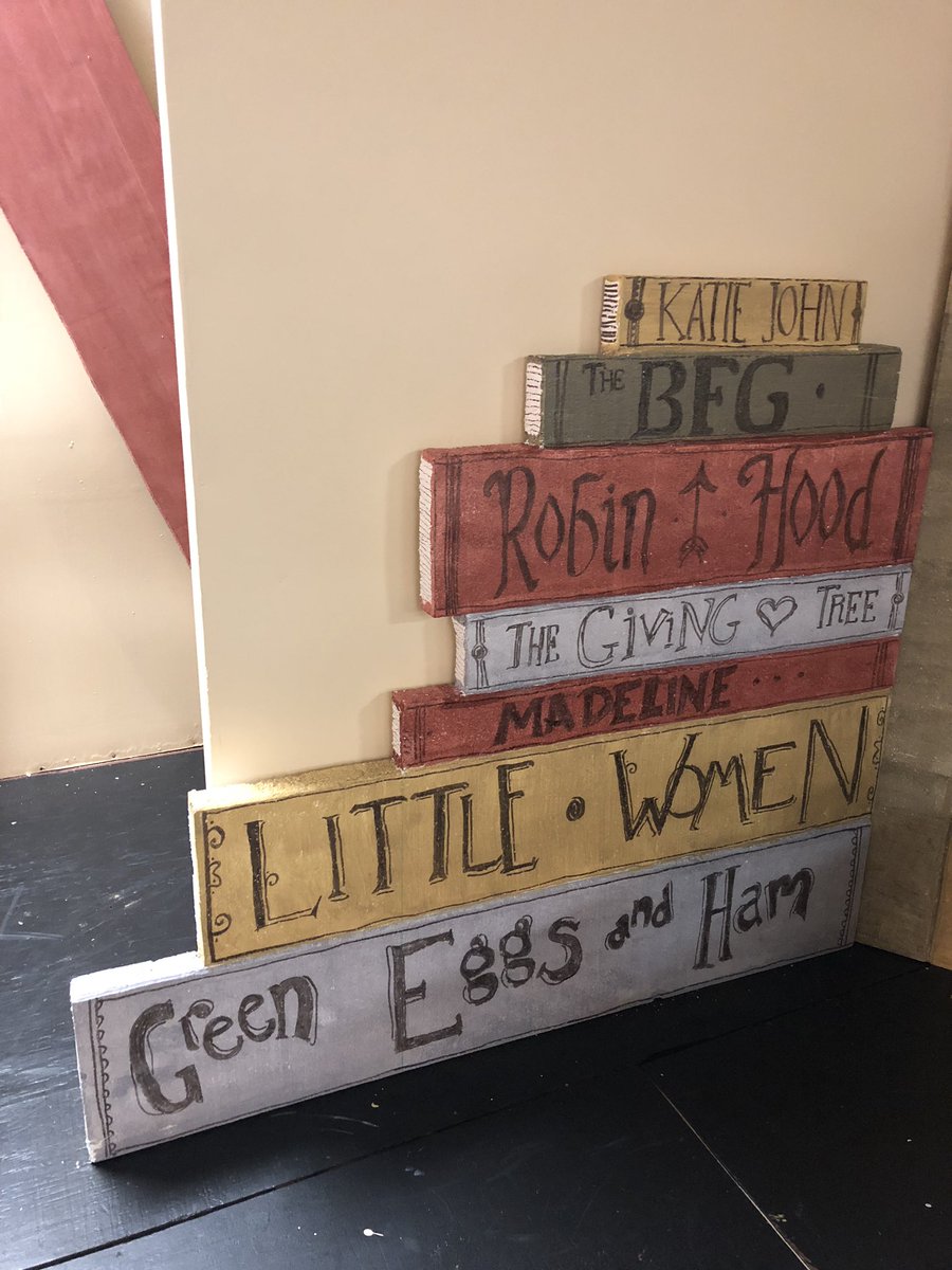 Giant books.  7 down.  35 to go.  What are you doing this weekend? #aliceinwonderland