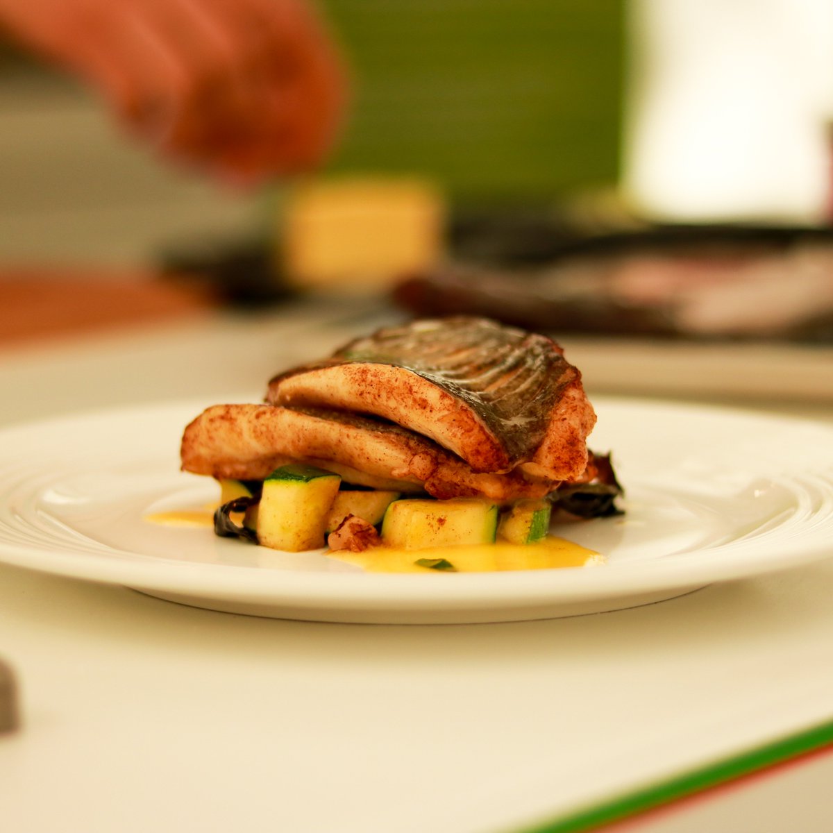 GalwayERG's tweet photo. Fantastic cooking demo by the talented @evanoceallaigh at @Congfoodvillage. He prepared an uncommonly used fish, John Dory, with courgette, dillisk, and beurre blanc. #GalwayGastronomy https://t.co/wkHkRxFQUx