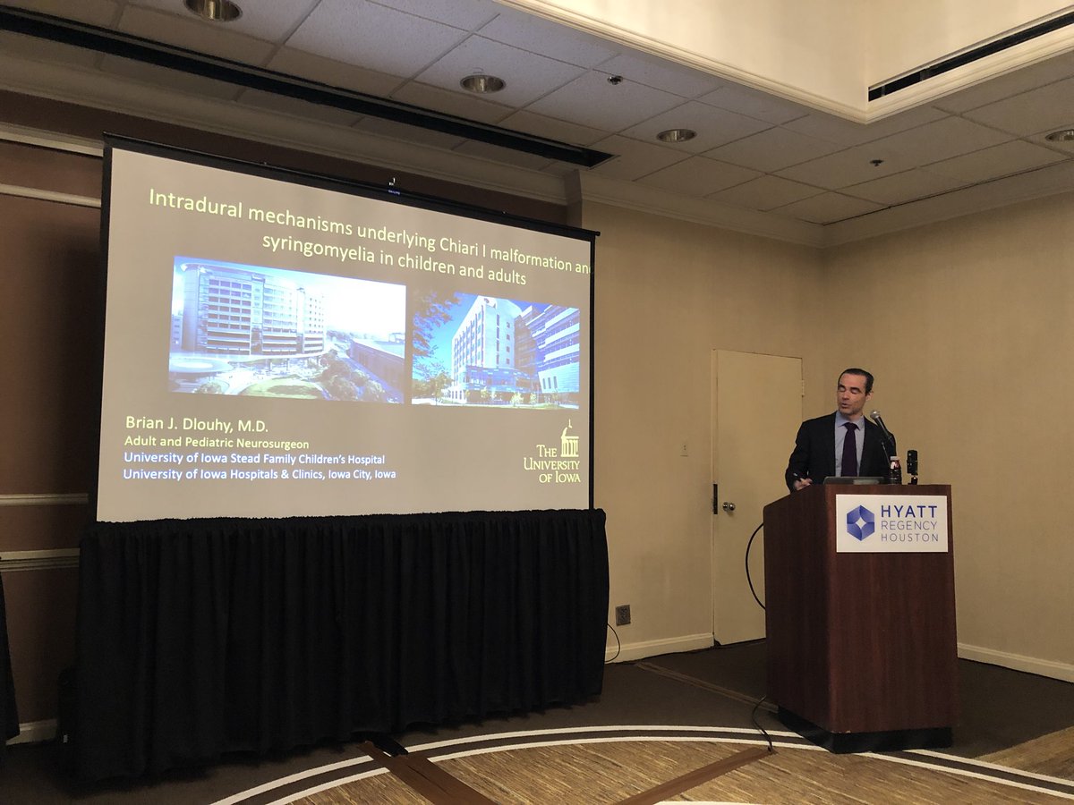 bobbyjonescsf's tweet photo. Dr. Brian Dlouhy introduces his work on the intradural issues affecting #Chiari and #syringomyelia, particularly the work trying to determine what causes these conditions. #CSFColloquium @thebraindocMD https://t.co/Z0ZCXT4Sxe