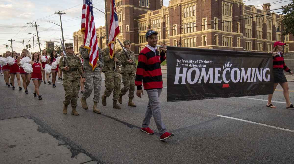 Enquirer's tweet photo. Scenes from the annual University of Cincinnati Homecoming Parade https://t.co/2ha07XT0rl https://t.co/IbvU4vGf82