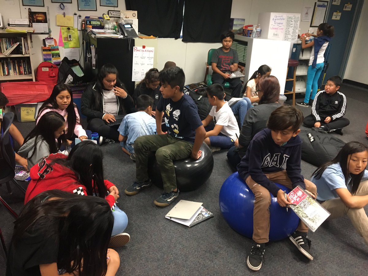 JellickBuck's tweet photo. Thanks @MsTracyDo for sharing examples about character analysis in literary essays for #WritersWorkshop. We appreciate how you interact with all of us. 😊 Can YOU spot our @JellickJaguar #TerrificTOSA? #WheresMsDo? #WeAreRUSD https://t.co/CzitGzgAOg