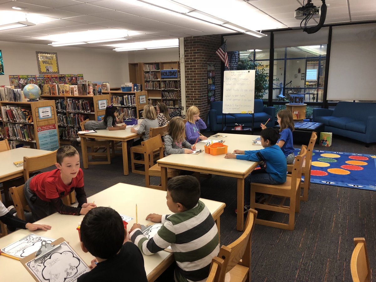 Harrison_LMC's tweet photo. Geniuses at work! Second grade geniuses working on their Genius Hour projects in the library.  This was the collaboration stage- offering suggestions to each other about their projects. #geneva304 #GameChanger304 https://t.co/4fNOktQcLu