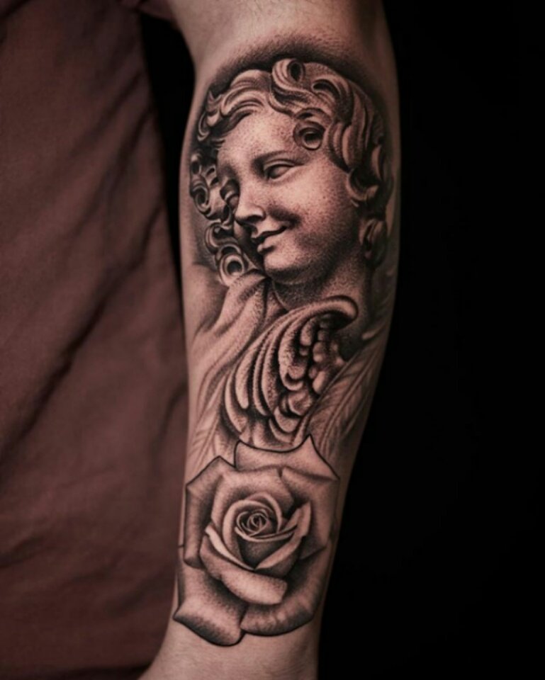 DaKid_LunA's tweet photo. Guardian Angel I got last week at the #RichmondTattooFestival by #Kiljun ๐ฅ https://t.co/VUsK42bYsA
