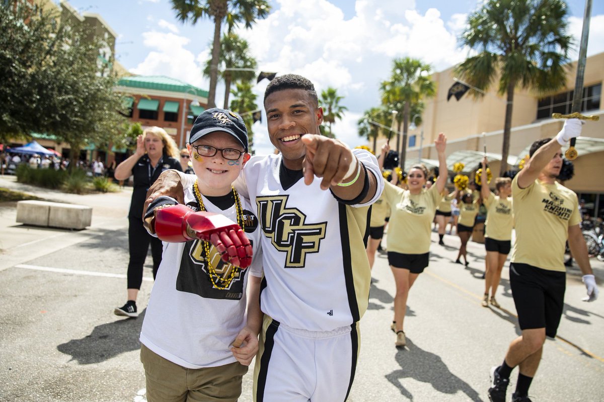 UCF's tweet photo. Marching to victory like #BionicKid Alex @Limbitless3D and @UCF_CheerTeam Jay this game day! https://t.co/PjGfQ6ZAoX