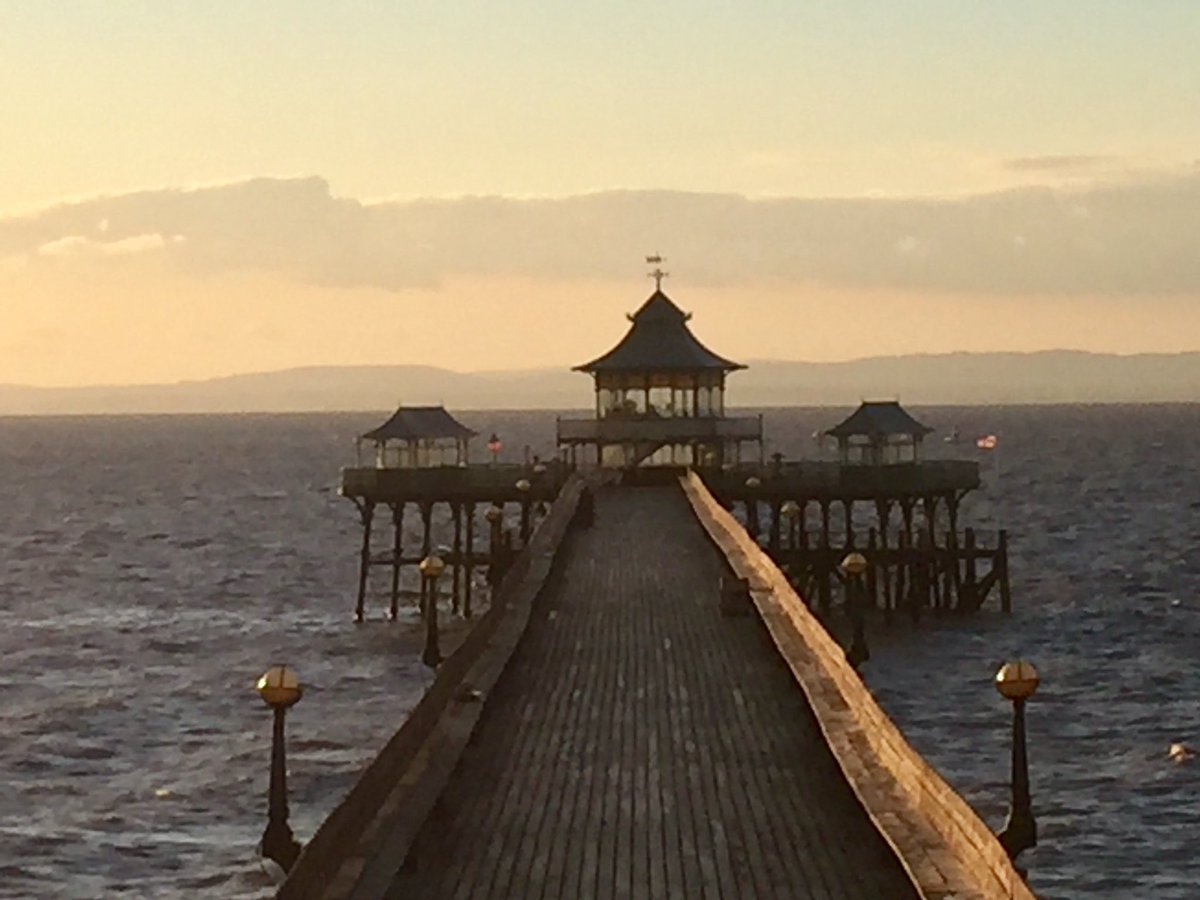The evening sun caught the northern edge of the pier nicely after the rain stopped at teatime. Dark water after a dull and stormy day.