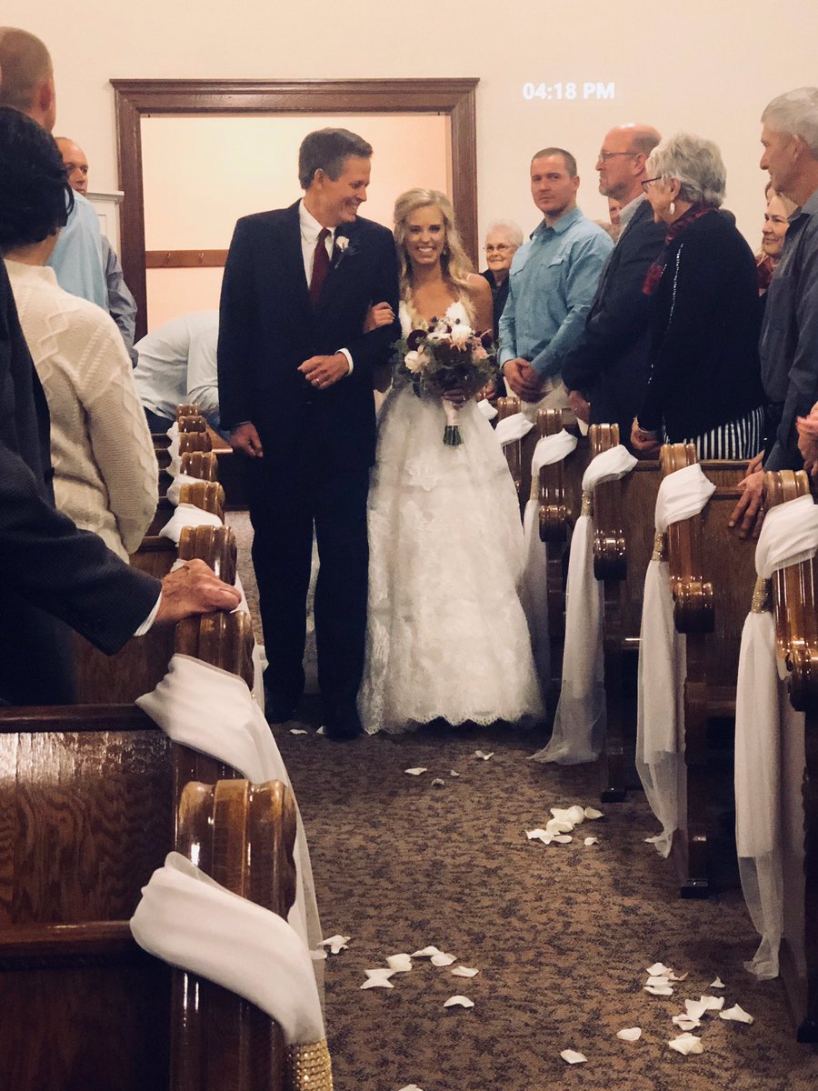 NEW: Time stamped photos show <a href="/SteveDaines/">Steve Daines</a> walking his daughter down the aisle in Montana while colleagues back in D.C. voted to confirm Justice Kavanaugh, per Daines office