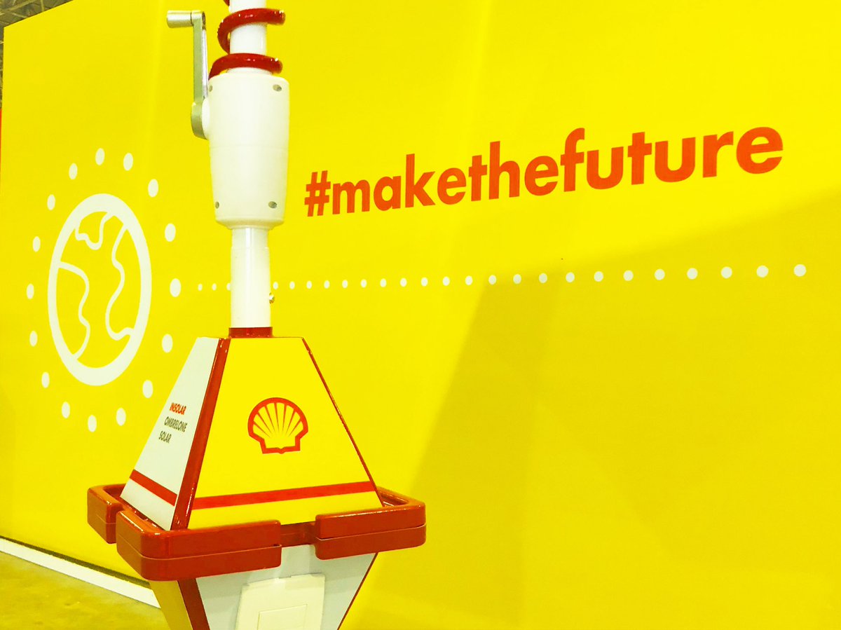InsolarWorld's tweet photo. @InsolarWorld’s Solar Umbrela, powered by Shell! https://t.co/kkJFJFsB1k