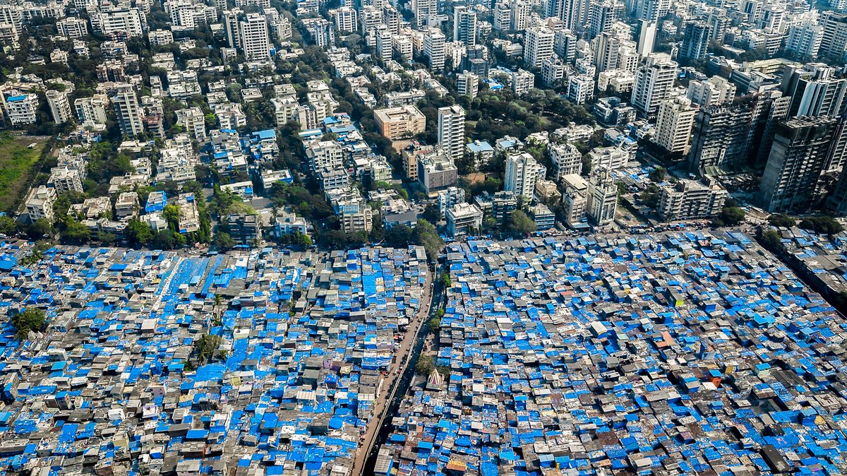 droneality's tweet photo. Drone photos of Mumbai reveal the places where extreme poverty meets extreme wealth #droneality #drone #dronefootage https://t.co/lwuyIwEdBJ https://t.co/hYkC0P6mjG