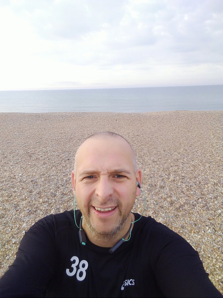runcraigierun's tweet photo. Little jog along camber sands this morning before the fitness classes start. Rocking the #asics26.2 bootcamp top https://t.co/RPOVZypxou