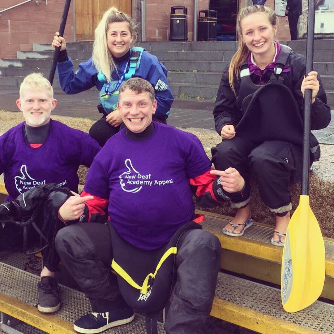 DeafAcademy's tweet photo. Yesterday some staff and students were at #ExeterSportsFest hosted by @DeafGetActive to try out #paddleboarding #kayaking & #climbing It was a ๐งday, but great turn out. CSW Ben did a brill job at the event for us & didnโt stop smiling all day! #newdeafacademy #lendahand #deaf https://t.co/TqYyuerGNM