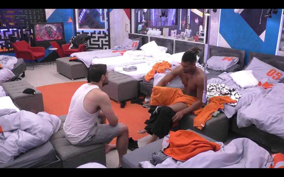 CelebWanker's tweet photo. Did anyone else love the moment @isaacjag was getting changed while chatting to @rhondda_the? We loved the flash of arse crack at the end, but we'd have loved it even more if #BBIsaac has flashed what was underneath that orange towel. #Isaac #BBUK https://t.co/hA3AnbnJcM