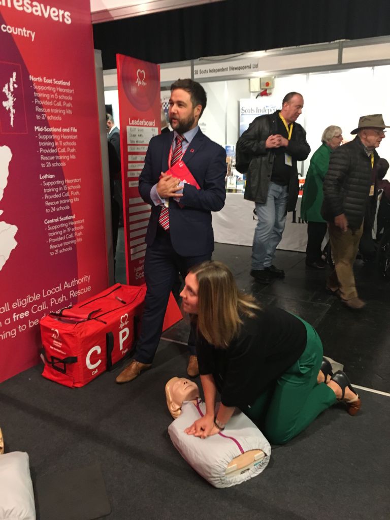 BHFScotland's tweet photo. @AnnaLangside gets a score of 98% at our CPR exhibition at #SNPConf ! Can you beat her? Come to Stand 7 to find out! #SNP18 https://t.co/ktFZg85E4e