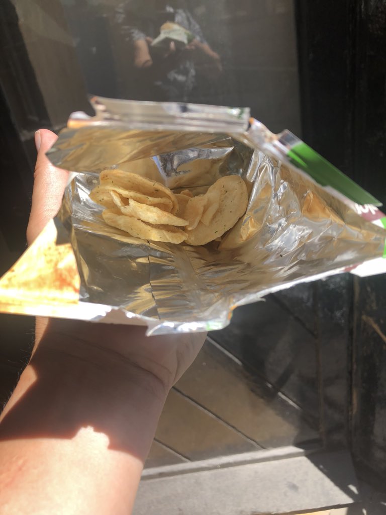 scamscour's tweet photo. Two culprits of frivolous waste and shameful hoodwinking of consumers: @popchips @popchipsUK @eatshoreditch. 

A pathetic amount of product for each pack’s size - lighter weight than advertised, appalling packaging waste, non-recycle materials. @lizbonnin #DrowningInPlastic https://t.co/SX9JMB1X94