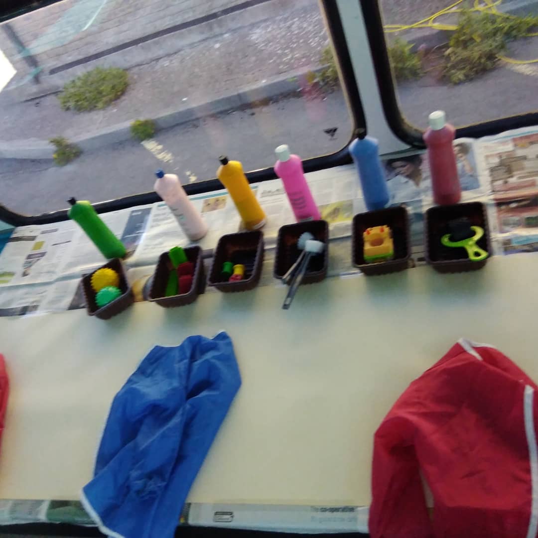 All ready for messy play this week on the bus