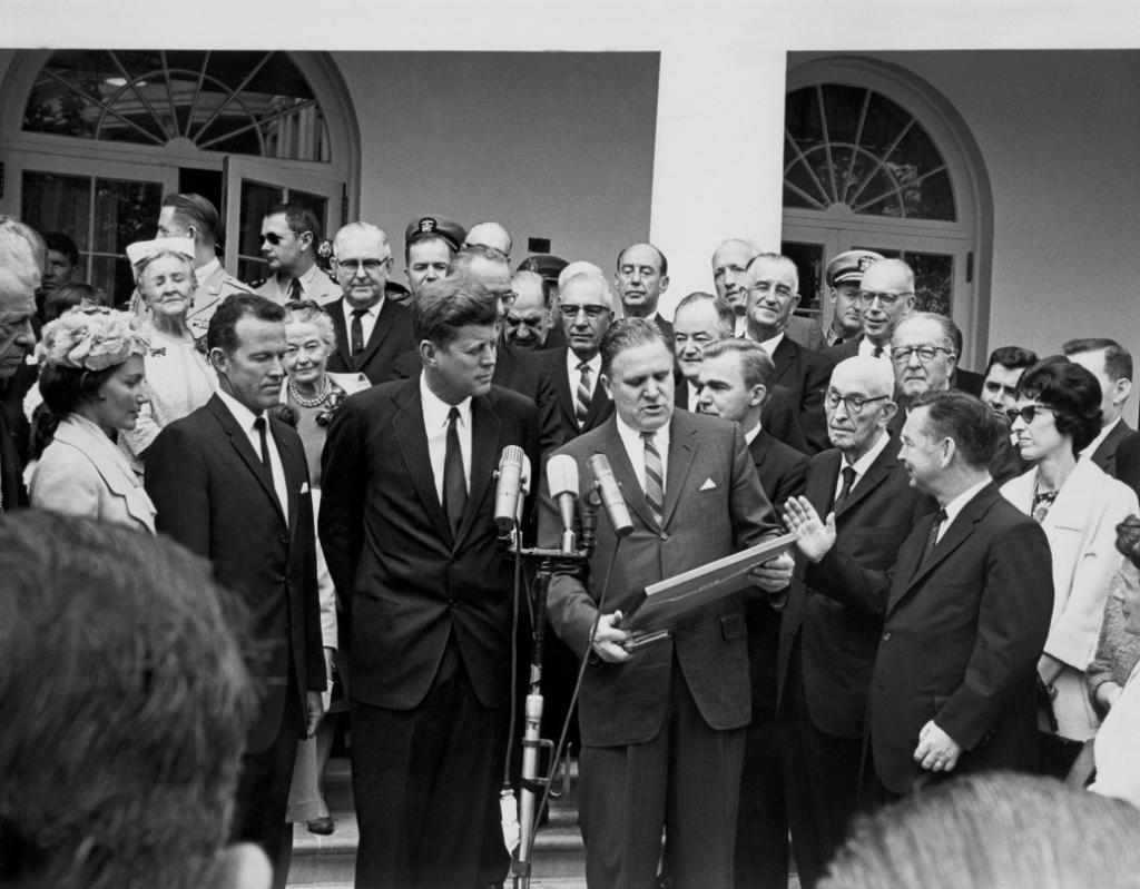 NASA Administrator James Webb receiving a plaque from President Kennedy during Distinguished Service Ceremony. Washington, DC at the White House
