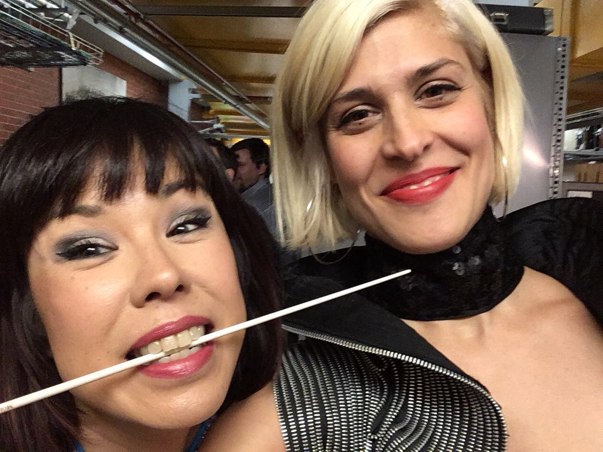dessadarling's tweet image. Gah, she’s cool. @chefdorch, with her instrument and a grateful co-star.