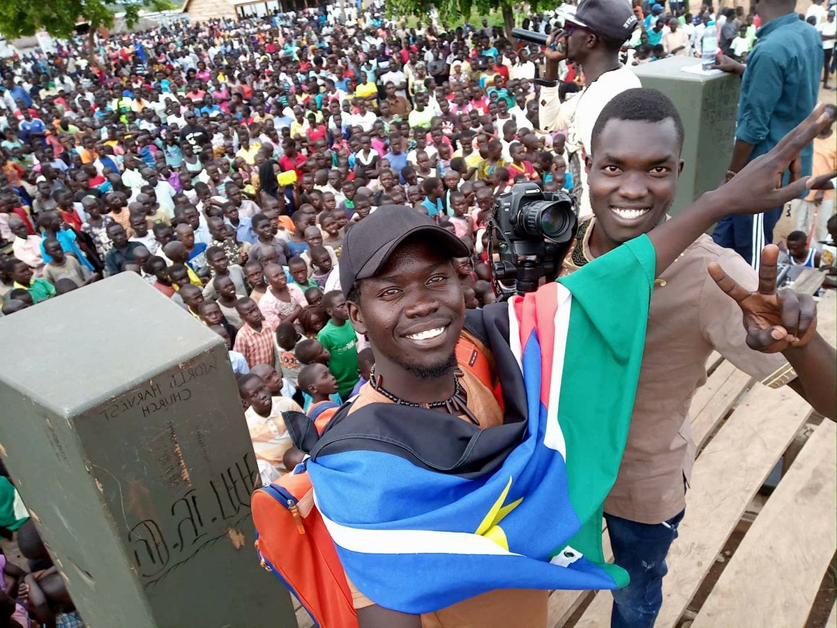 defyhatenow's tweet photo. How can music contribute to peace? We were so impressed to see South Sudanese communities at #Rhino refugee camp come together to celebrate #PeaceDay at the #PeaceJam18 concert. #defyhatenow https://t.co/extEVqYX2U