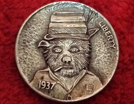 Hobo_Nickel_Soc's tweet photo. I saw a #werewolf at the bus stop this morning. Or possibly just a very hairy guy. Either way, the silver bullets worked. #SundayFunday #BadJokeSunday #HoboNickel #CoinCarving by #AdamLeech @theleechpit #Wolfman #DogFacedBpy https://t.co/7c25A2jIrt