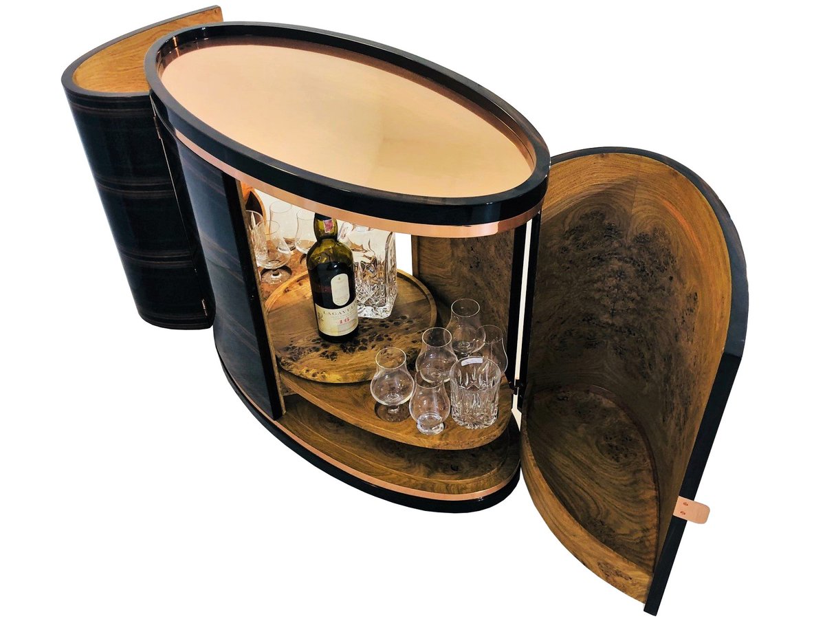 OAFGermany's tweet photo. This #whiskey bar cabinet features a  massive, polished copper top as well as luxurious macassar and rose oak  wood. A masterpiece of craftsmanship, now available on our homepage: https://t.co/r7JQ5WGvGx 👈 
We 💖it!  #designfurniture #interiordesign #customfurniture #luxury https://t.co/GtISHqvafd