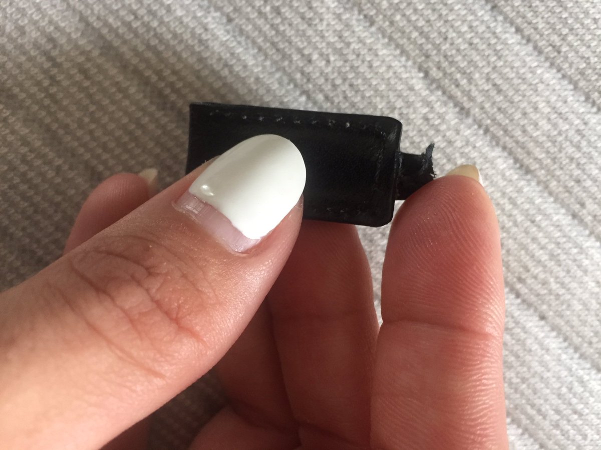 K8Born's tweet photo. @Prada help!! Both zipper pulls have ripped off. How can I get this fixed?! #ripcamerabag https://t.co/csSFNyj4Xz