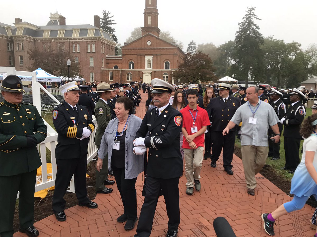 LCFR_HG's tweet photo. The families of the 103 Fallen Firefighters being escorted to their seats through the Sea of Blue for the NFFF Memorial Ceremony #FireHero2018 https://t.co/99u7FTxotE