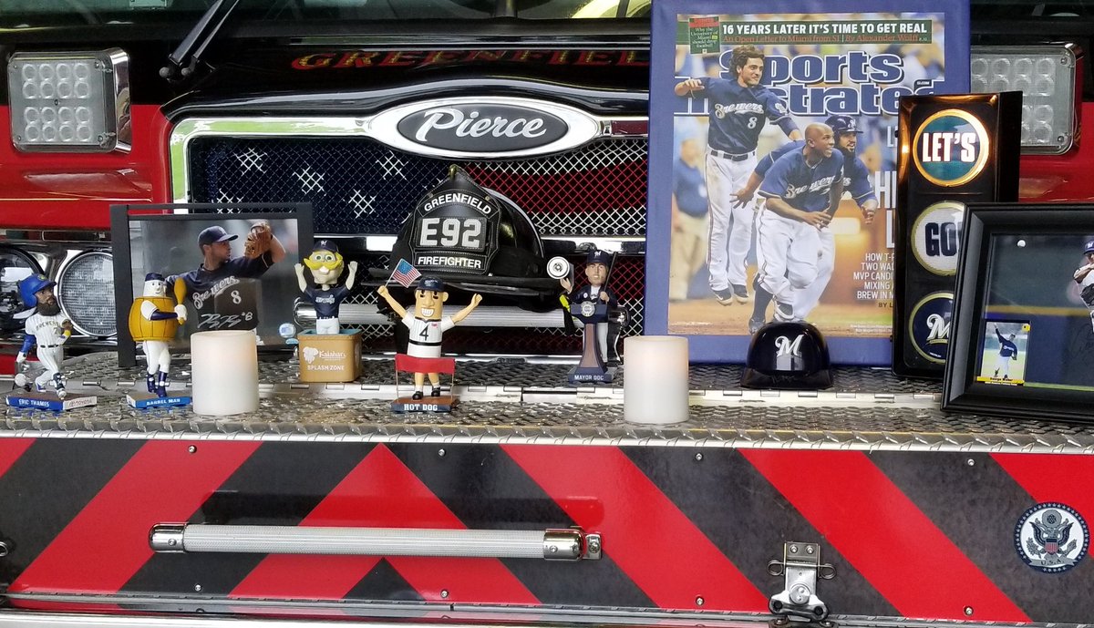 greenfieldfire's tweet photo. We are not superstitious; ok, a little. So we set up our @Brewers shrine hoping for the sweep.  (Note: those are battery powered candles as we always practice #FirePrevention #SafeAtHome #SafeAway.)  #NLDS #LetsGoooooooooo https://t.co/FlcsQb4NUB