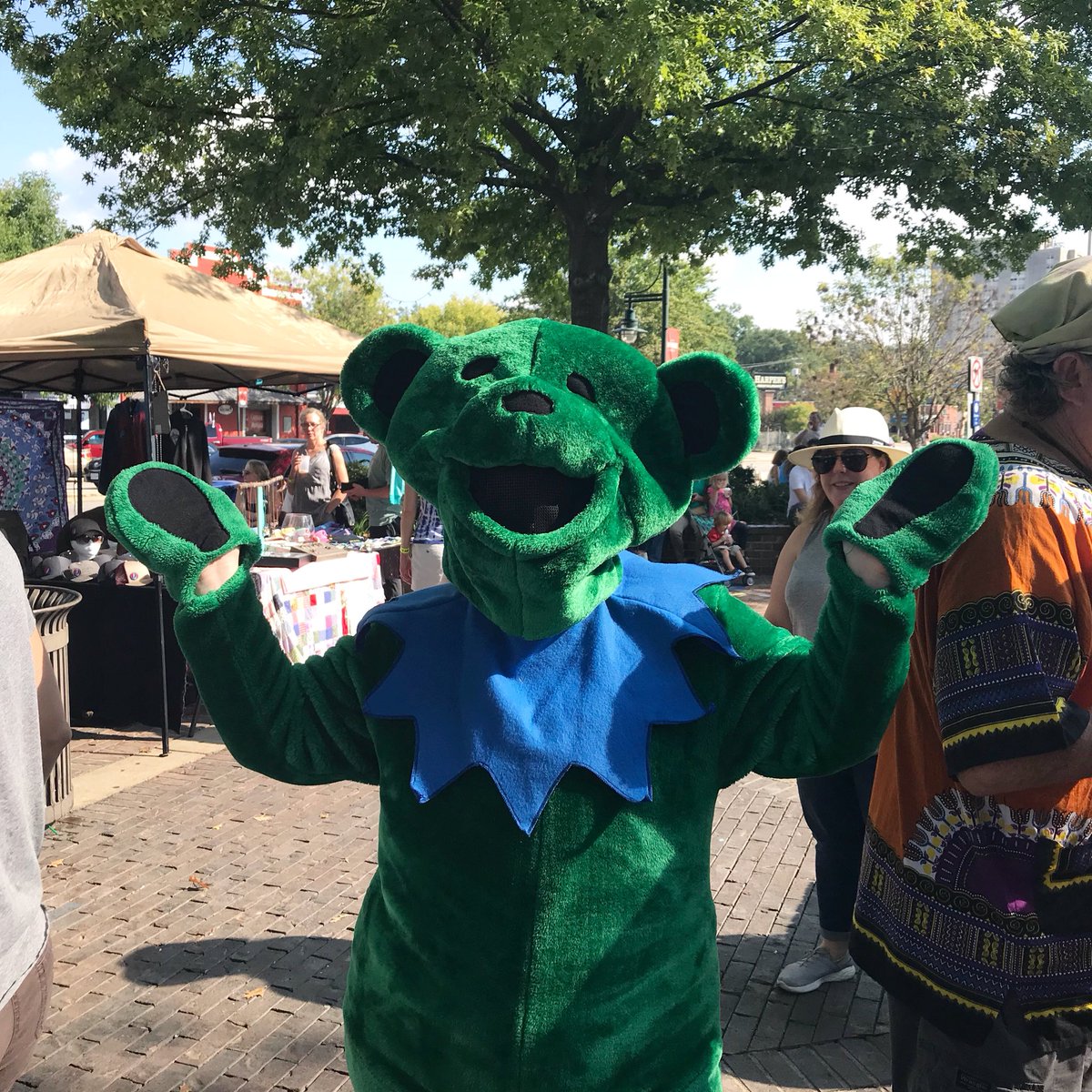 colacrescent's tweet photo. Great food, great music, great humans, and a bear who probably needs a beverage already. Come join us for #jerryfest in @FivePointsSC! Now until 10, free! #realcolumbiasc #gratefuldead #jerrygarcia #musicfestival #fivepoints https://t.co/8a4L9EUg1k