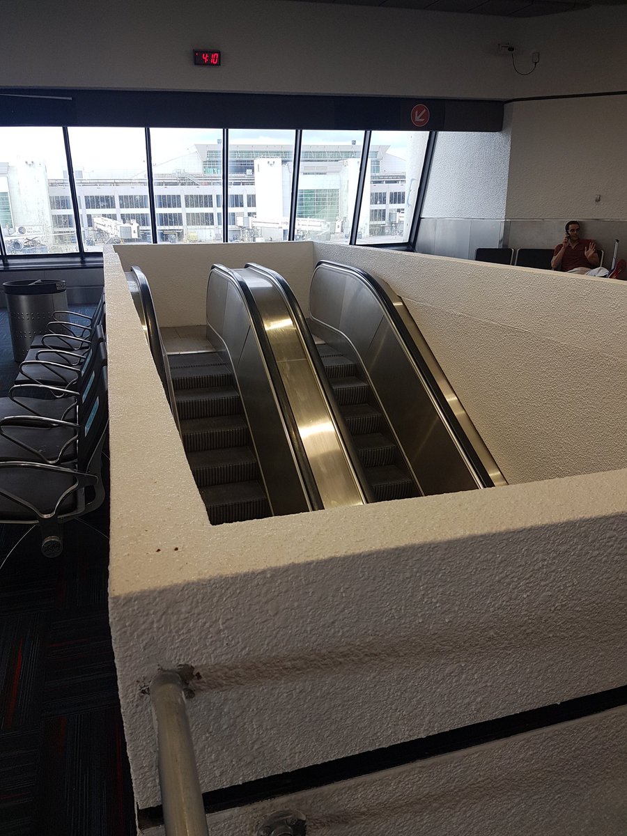 davidiwanow's tweet photo. Oh you sure you wanted the escalator installed here... @_youhadonejob1 #gate33 #Miamiairport https://t.co/IVTxVWz228