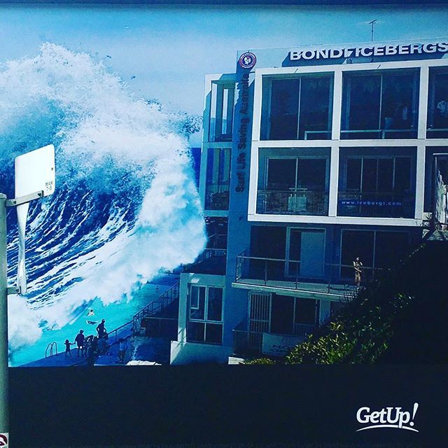 Su_Hansen's tweet photo. At my front door a @getup_australia billboard re the Liberals policy on #ClimateChange @icebergsclub The only thing is some locals will vote yes for that swell ......? What say #bondilocal https://t.co/CqQg0bt5L3 https://t.co/ITs49mS8vR