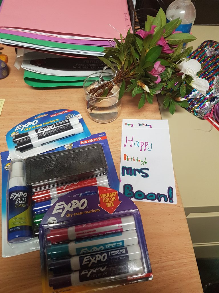 kath_boon's tweet photo. I am feeling the love from #6B2018 today. It seems they know me very well...whiteboard markers and a cuisinaire rod/fraction cake! Not sure whether to be proud or worried that one student asked for 5 quarters of my cake! Thank you for spoiling me on my birthday! https://t.co/uNg3FgH2G6