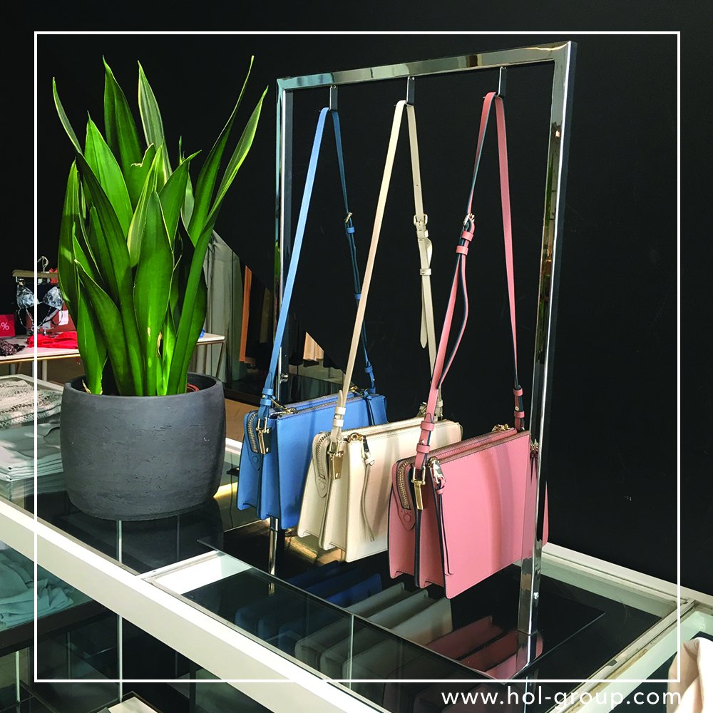 H.O.L Group designed a modern range of accessory props called Finsbury, which brilliantly complements Reiss’ range of accessories. hol-group.com #theHOLway #reiss #retail #retaildesign
