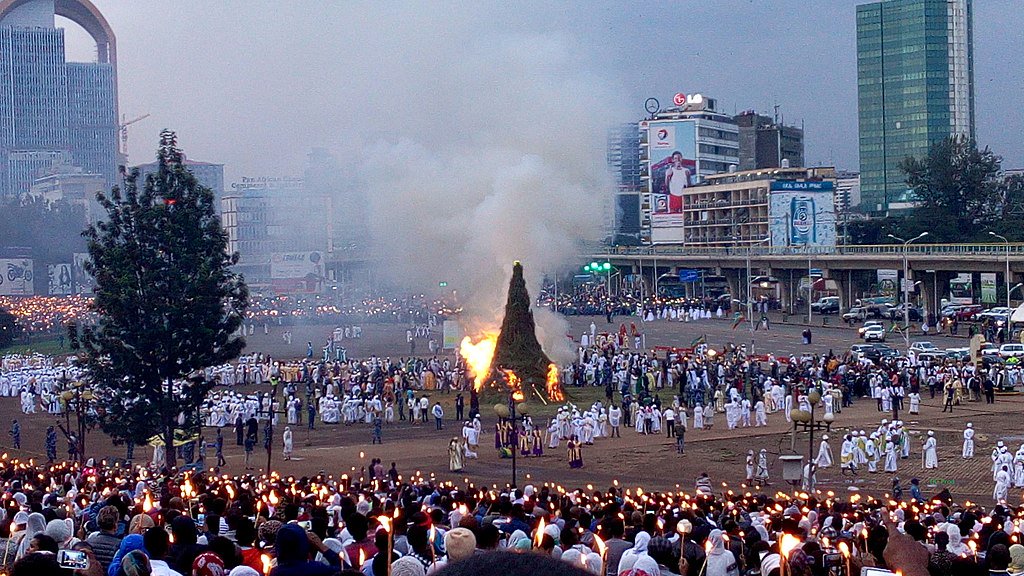 baseethiopia1's tweet photo. The feast is held in Meskel Square,named after the festival. Religious  and civil leaders preside over the celebration.Many Ethiopians who live  in cities return to their villages to celebrate the national event. When  it gets darker,the Demera is burned.#mesekelcelebtation https://t.co/KJKIiyUiIh