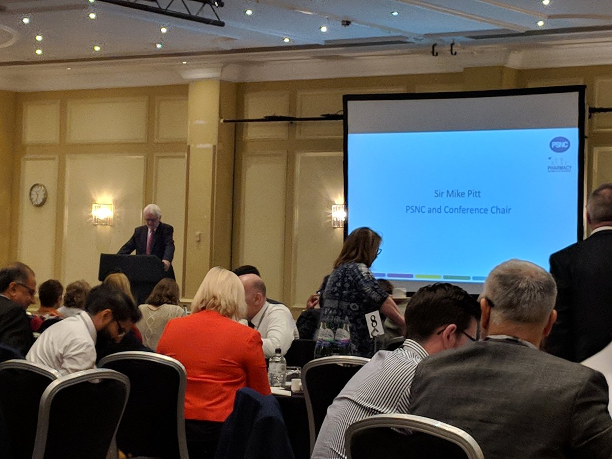 Grace_Lewis88's tweet photo. Sir Mike Pitt kicks off @PSNCNews #LPCconf, telling delegates to consider the context we're currently working in. "I would like to continue the last two years to history. Things are beginning to change" (no, Sir Pitt is not tiny, I'm just really far away) https://t.co/x0pEwWpEXT