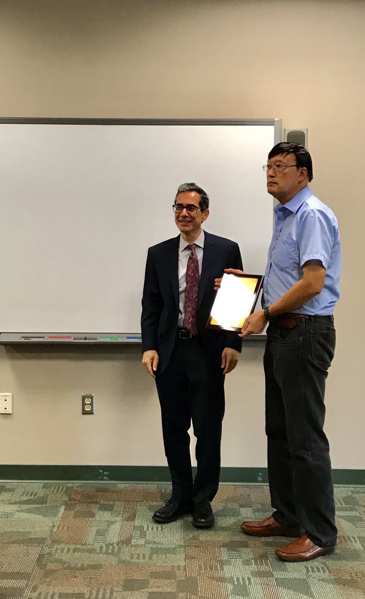HudsonCCC's tweet photo. Dr. Eric Friedman, Executive Vice President and Provost, recognizes Prof. Ted Lai for his remarkable work as the HCCC PTK Advisor. Convocation 2018 #HC3Convocation @hccc_ptk #HC3PTK #HC3Fall2018 https://t.co/qeoKo96Oow