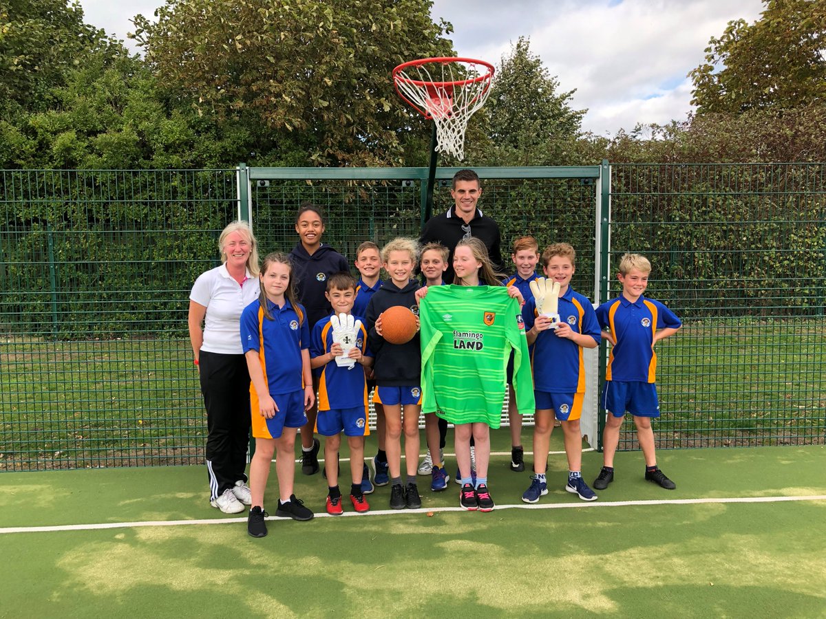 WeltonPrimary's tweet photo. Thank you to Eldin Jakupovic for opening our new MUGA all-weather pitch today and for presenting the school with a signed shirt and gloves to commemorate the day.  The Y6 netball and football team all enjoyed a game of netball with Eldin after the opening! #proud https://t.co/T7fY9h628U