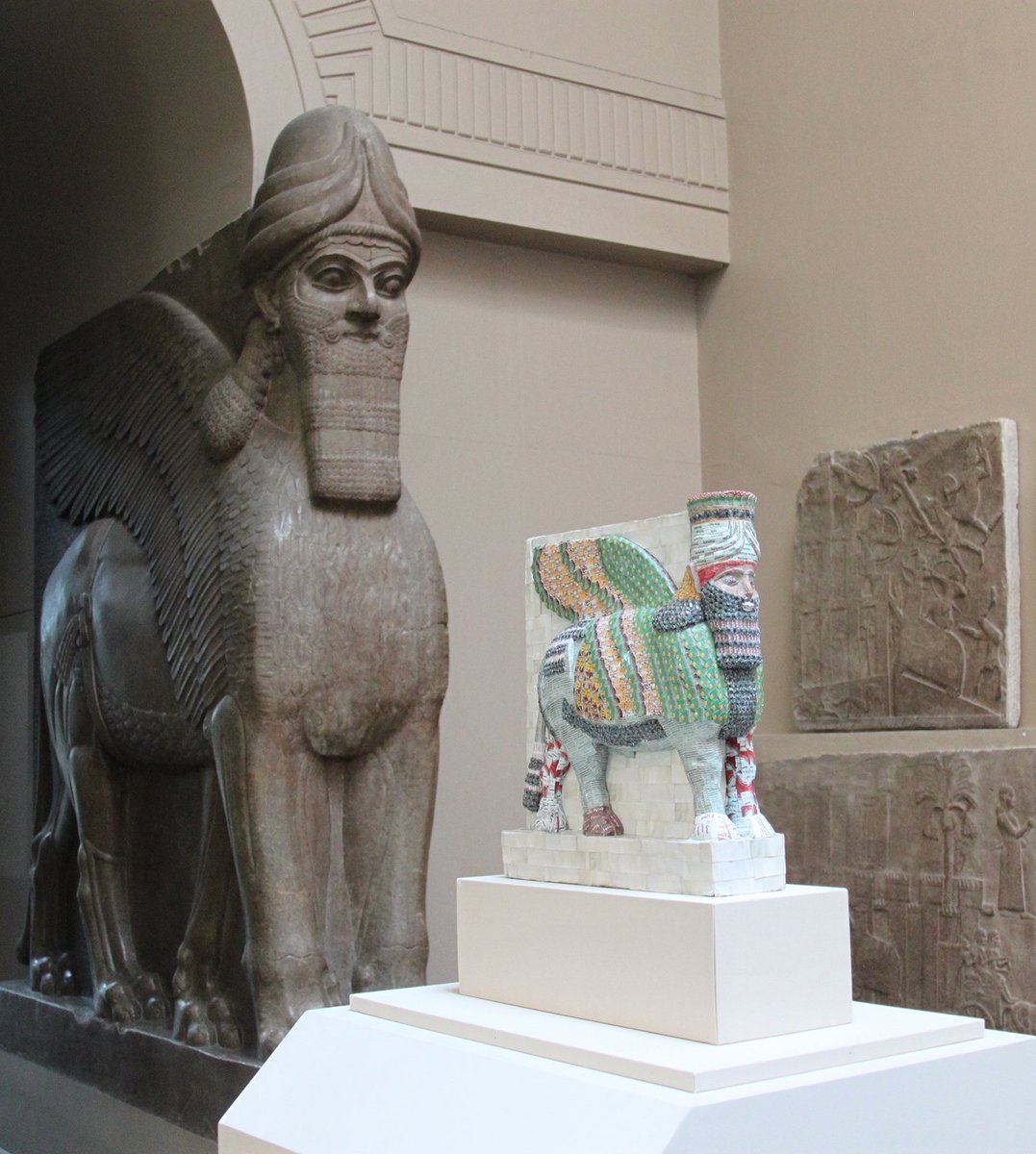 Lamassu (human-headed winged bulls) guarded the palaces and