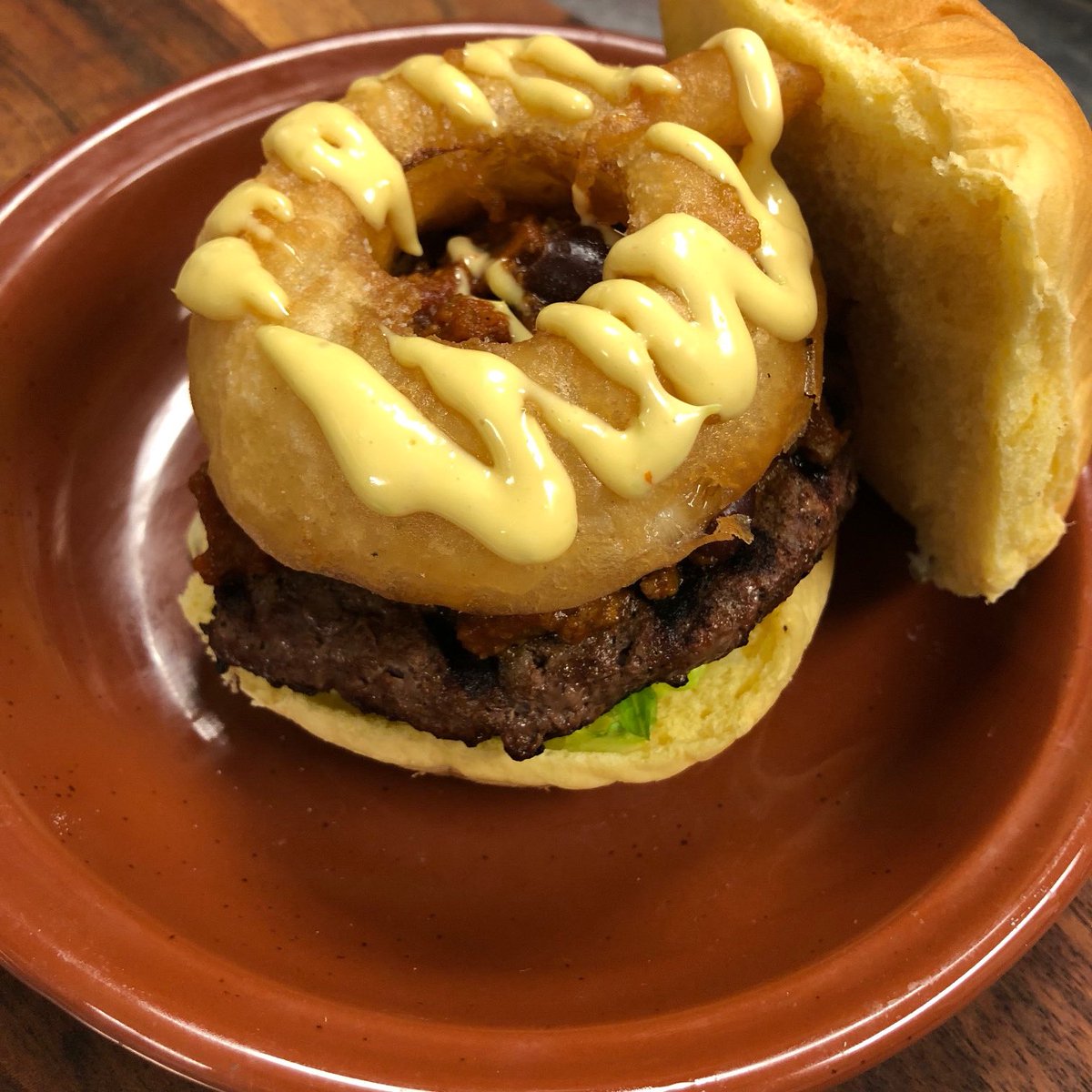 EatAlPastor's tweet photo. Come try our Tex Mex Burger half off today! Made with a beef patty topped with chili con carne, beer battered onion ring and long hot aioli! 🔥🍔 #meatloversonly #eatalpastor https://t.co/B4KTOWCjyh