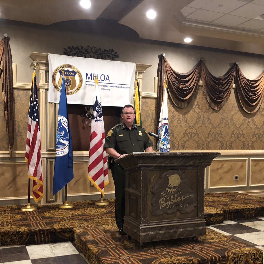 MELOAUSA's tweet photo. Scott Luck, Deputy Chief of the @CBP Border Patrol speaks to guests at the #MELOA2018 conference in #Dearborn https://t.co/IfQrEqgLOG
