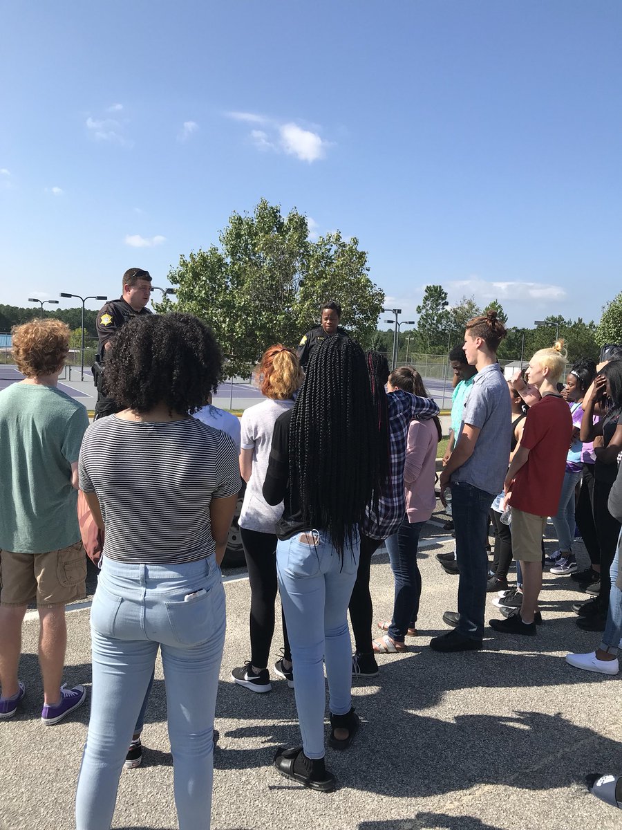 RVJournalism's tweet photo. Deputy Darnell and Deputy Bowman speaking to students about impaired driving and the dangers of it relating to the “Beginning of Everything” #RVReads18 #RVReads2018 https://t.co/A66V5mZhQ7