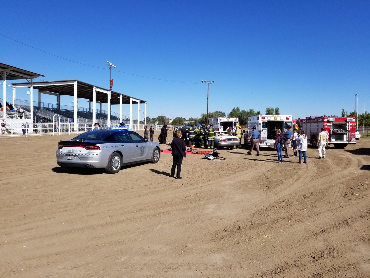 Every 15 Minutes crash scenario-high school kids involved in crash-fatalities and injuries. One DUU driver under arrest