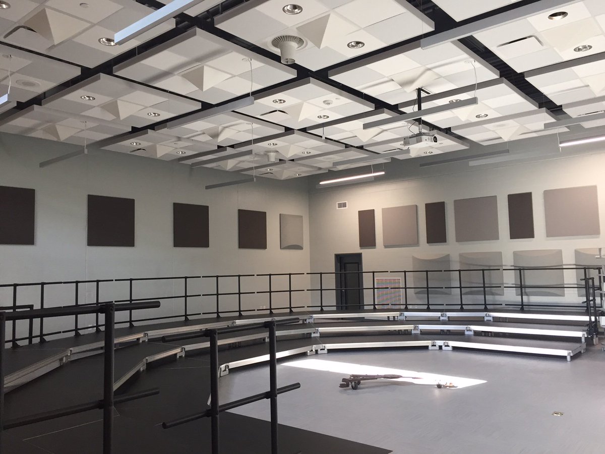 These unique clouds at Port Washington High School are a combination of tiles with angular Pyramidal diffusers that create an acoustical solution ideal for band, choral, and music facilities.
