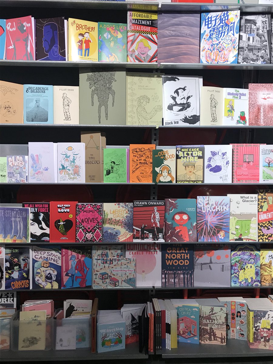 hairdrillhoney's tweet photo. Career milestone: first time my zines are for sale at a bookstore! (The cool people at @GoshComics bought stuff from me and @SuitedDevil after #thoughtbubble2018 )
Canโt believe Iโm on the same shelf as @sophieyanow ;w; https://t.co/P1O84YIJrB