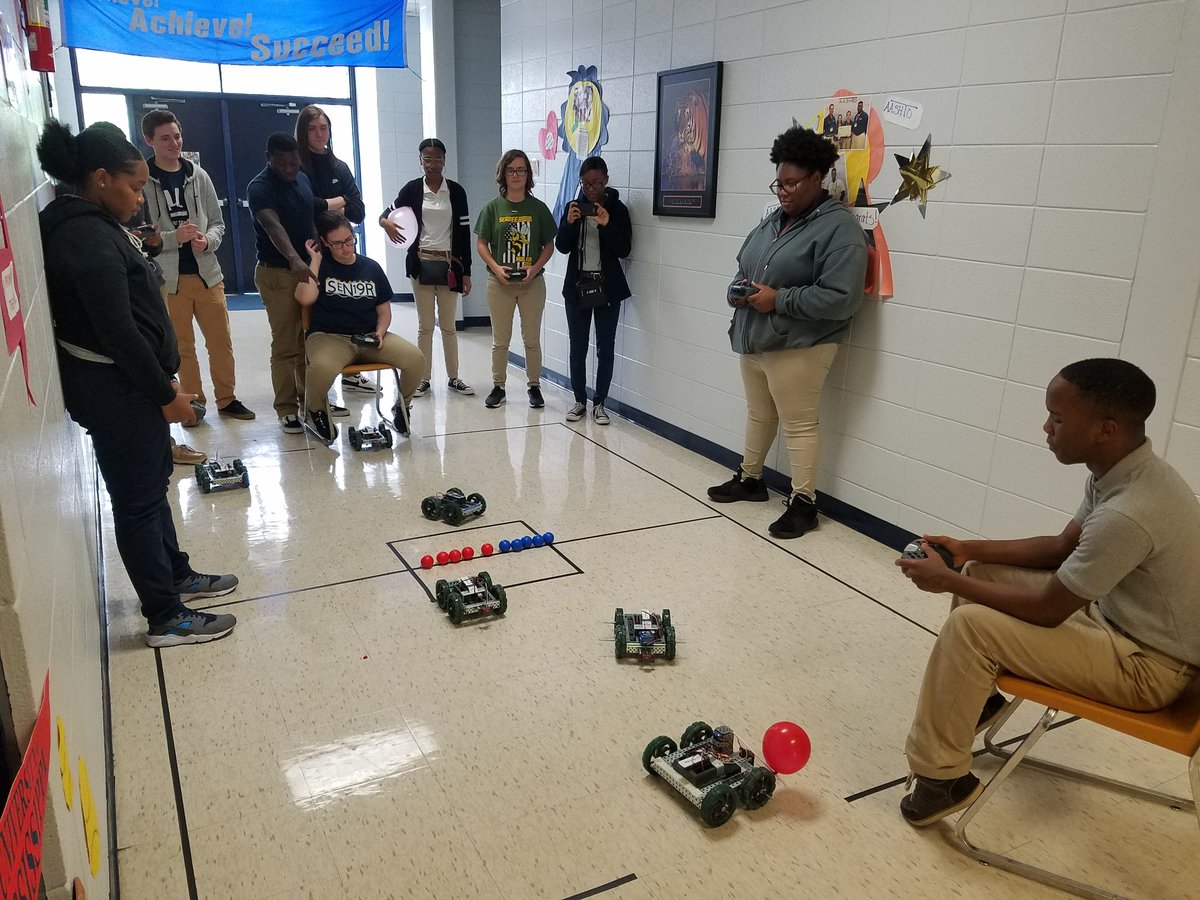 MPCTE students compete in "Robot Wars". Students had to build and program their own robots in order to participate. Objective: The student/team that is able to get the most balls into the opposing student's/team's goal wins!!! Go Tigers!!!